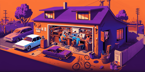 Young people working on their computers in the garage, startup